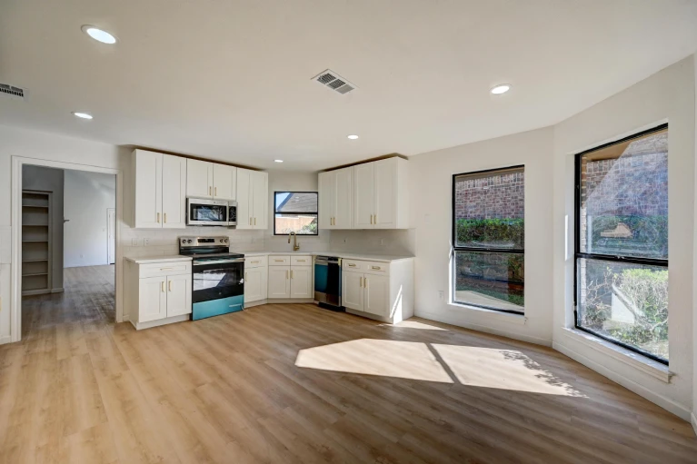 Farmers Branch TX kitchen remodel with white cabinets and open layout