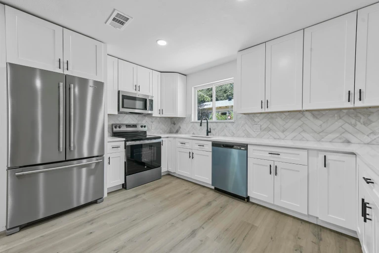 Spring Valley Drive Bedford TX kitchen with stainless appliances