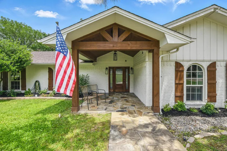 Colleyville TX full house remodel with wood truss front porch